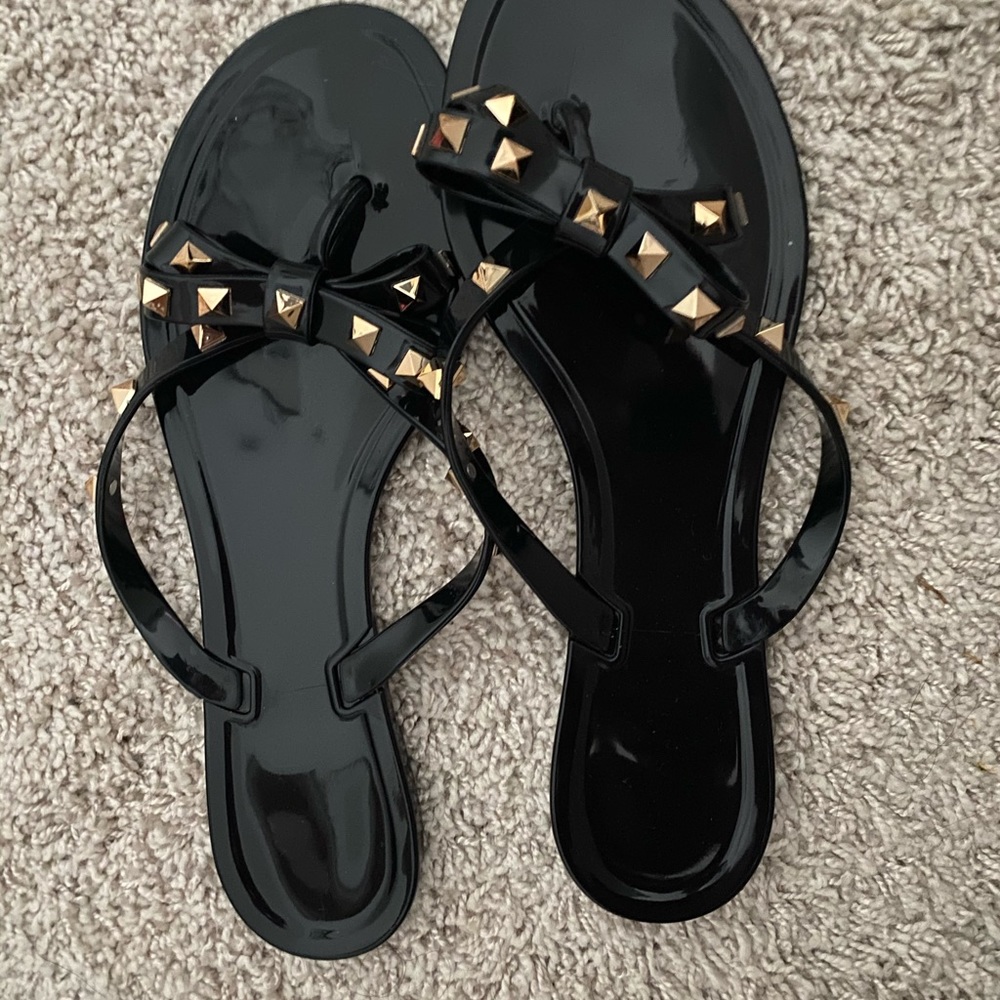 Black and gold sandals
